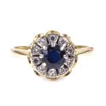 An 18ct gold sapphire and diamond cluster ring, setting height 10.6mm, size N, 4.1g