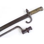 A 19th century brass-hilted sword bayonet, length 69cm, and another bayonet (2)