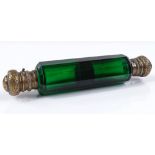 A Victorian Bristol Green facet-cut glass double-ended perfume bottle, with gilt-brass tops,