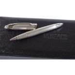 A Versace ballpoint pen, brushed and polished chrome, original box and papers