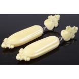 A pair of Edwardian carved ivory pendant earrings, height 63.9mm
