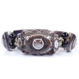 An unusual banded agate bracelet, with bead spacers and nylon string, internal diameter 57mm, 72.4g