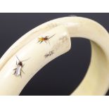 A 19th century ivory and shibayama inlaid bangle, with applied stone insects, internal diameter 68.