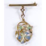 An Edwardian 9ct gold pearl and coloured enamel stylised pendant brooch, with openwork iris body and