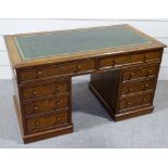 A Victorian mahogany pedestal desk, inset green leather top, with 8 panelled drawers below, 4'6" x