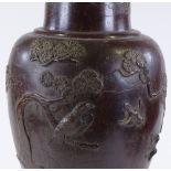 A large Japanese patinated bronze vase, with relief bird decoration, early 20th century, height 71cm