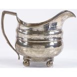 A Georgian silver cream jug, with foliate engraved frieze, possibly by Thomas Wallis II, hallmarks