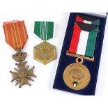 An American military Merit medal, an Iraq medal 1991, and a Belgian Cross (3)