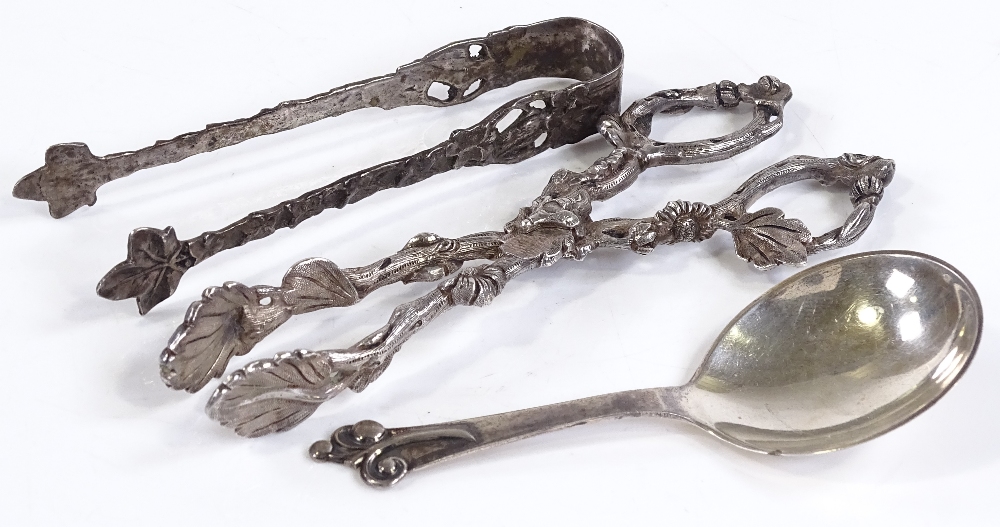 A pair of unmarked silver sugar nips, together with a pair of Swedish silver tongs, and a Danish - Image 2 of 3