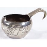 A Russian silver kovsh, with engraved floral decoration, maker's marks HE, length 8cm