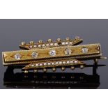 An unmarked gold diamond and seed pearl bar brooch, with rope twist surround, length 38.4mm, 8.6g (1