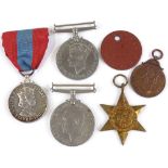 An Imperial Service medal, and other Second War medals
