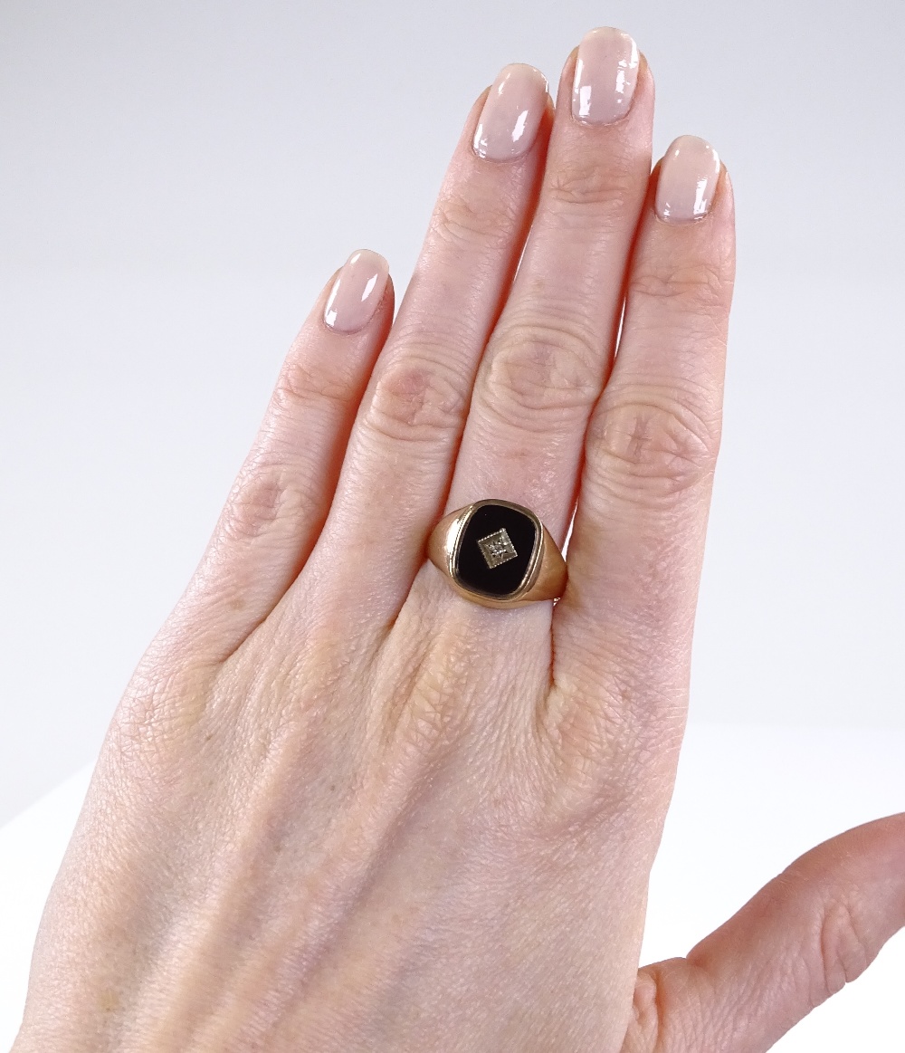 A 9ct gold onyx and diamond set signet ring, setting height 14.6mm, size S, 3.3g - Image 4 of 4