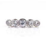 An 18ct gold 5-stone graduated diamond ring, central stone approx 0.21ct, total diamond content