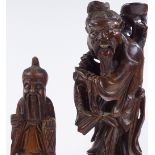 2 Chinese carved and stained wood standing figures, largest height 35cm