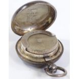 A circular silver sovereign case of plain form, by A & J Zimmermann, hallmarks Birmingham 1902,