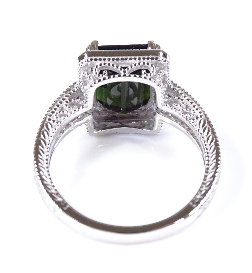 A 14ct white gold green tourmaline and diamond cluster ring, emerald-cut tourmaline approx 3.2ct, - Image 3 of 4