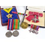 An MBE group of 3 Second War Service medals and miniatures, together with the Most Excellent Order