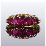 An 18ct gold 5-stone ruby half hoop ring, setting height 6.7mm, size O, 3.1g