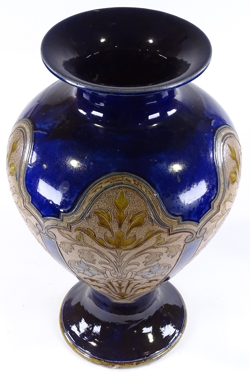 A large Royal Doulton stoneware blue ground vase, circa 1900, with panels of incised floral - Image 2 of 3