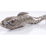 An unmarked silver articulated fish box, modelled as a pike, with stone set eyes, length 15cm