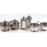 A set of 6 circular cruets, including condiments, salts and pepperettes, by Walker & Hall, hallmarks