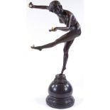 A reproduction bronze naked dancer on marble domed base, height 46cm