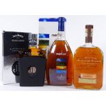 1 bottle of Jack Daniels Monogram Bourbon, a bottle of Labrot & Graham Woodford Reserve, and a
