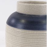A Susie Cooper Art Deco ribbed pottery Studio vase, incised signature under base with no. Pat296,