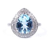 A 14ct white gold blue topaz and diamond cluster ring, pear-cut blue topaz approx 4.42ct, total