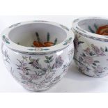 A pair of Chinese porcelain fish bowls, diameter 36cm, height 30cm