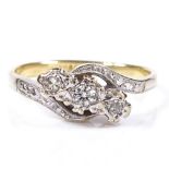 An 18ct gold 3-stone diamond crossover ring, platinum-top settings, setting height 7mm, size O, 3.6g