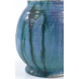 An Oxshott Pottery vase by Denise Wren, circa 1930s, with blue drip glaze, height 13.5cm