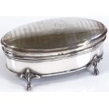 An oval silver-mounted jewel box, with engine turned lid, by Cornelius Desormeaux Saunders and