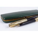 A Parker gold plated fountain pen and matching propelling pencil, cased