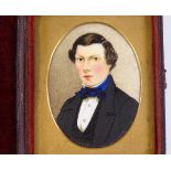A 19th century miniature watercolour portrait of a gentleman, in original red leather case, case