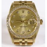 An 18ct gold Rolex Oyster Perpetual Datejust Automatic wrist watch, with diamond set hour markers,