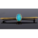 A 15ct gold black opal bar brooch, panel height 13.8mm, brooch length 60mm, 3.7g (opal chipped)