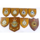 A group of Air Force crests on wooden plaques (8)