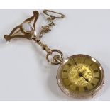 A 9ct gold open-face top-wind fob watch, with floral engraved case and face, case no. 101168, case