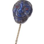 A very unusual carved labradorite head stickpin, with red stone set eyes, possibly rubies, unmarked