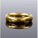 A heavy 22ct gold wedding band, band width 4.9mm, size Q, 10.9g
