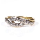 An 18ct gold diamond crossover ring, platinum-top settings, setting height 6.1mm, size L, 3.6g