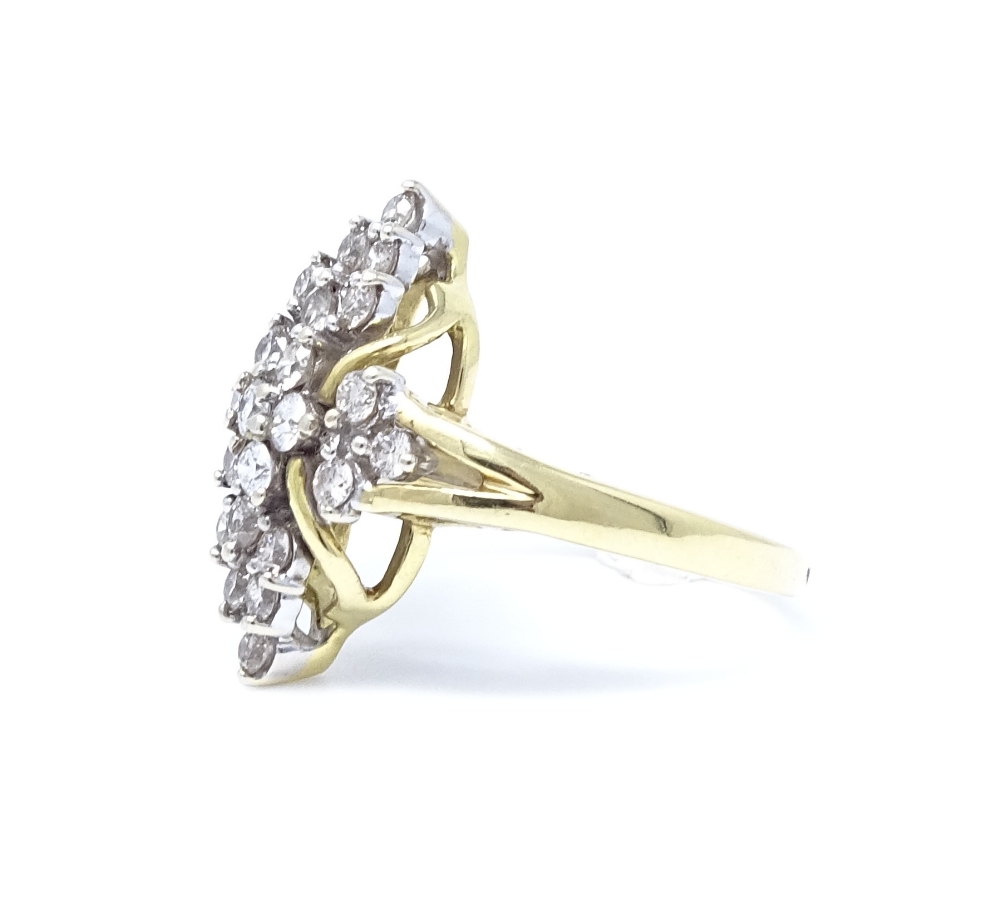 An 18ct gold diamond cluster ring, total diamond content approx 1ct, setting height 21mm, size N, - Image 2 of 4