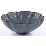 A Chinese blue ground porcelain lotus design bowl, diameter 12.5cm