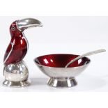 A Danish sterling silver and red enamel cruet set, comprising toucan-shaped pepperette and salt bowl