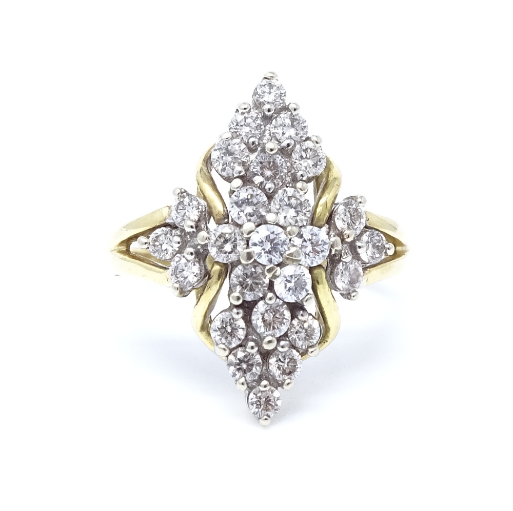 An 18ct gold diamond cluster ring, total diamond content approx 1ct, setting height 21mm, size N,