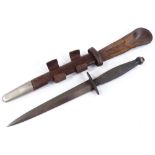 A Commando fighting knife, no maker's marks, in leather and nickel plate sheath