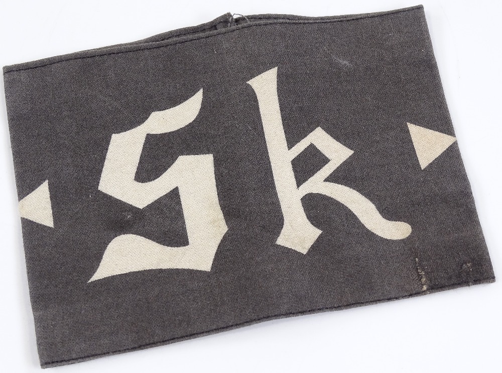 An SK cloth armband