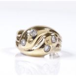 A 9ct gold diamond double snake head ring, setting height 13.8mm, total diamond content approx 0.